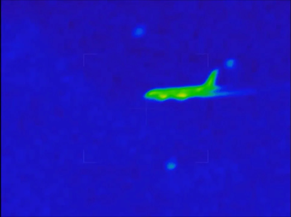 Thermal video frame showing the 777 with orbs